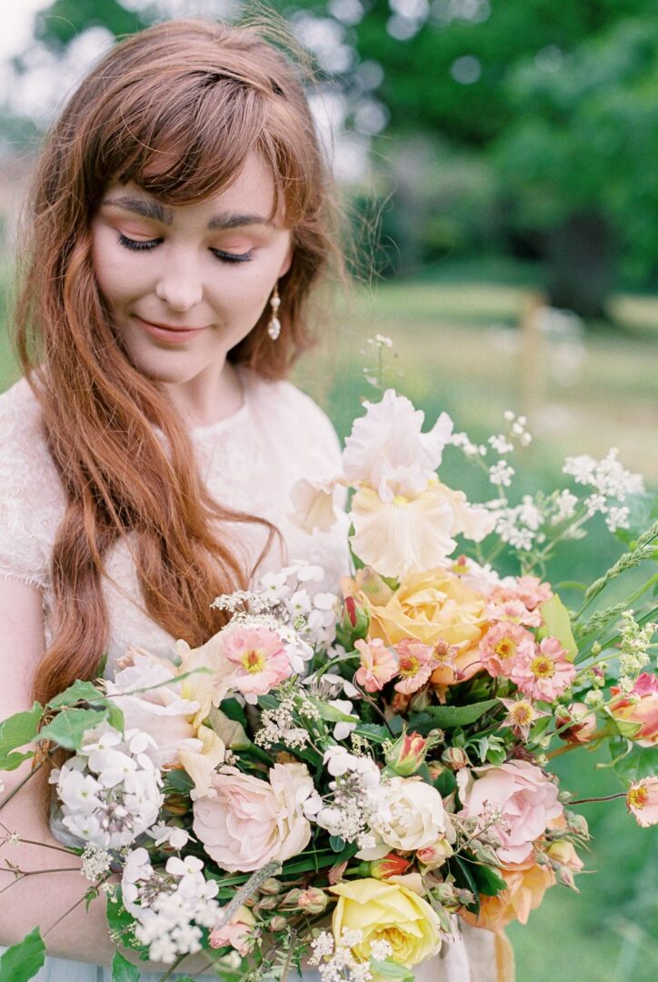 bride with a beautiful flower bouquet